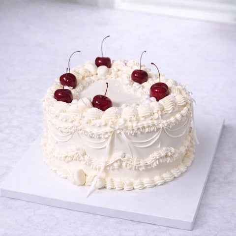 White Vintage Style Cake with Cherries
